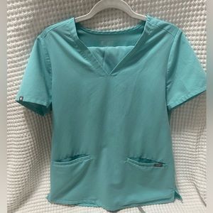Teal two pocket figs top